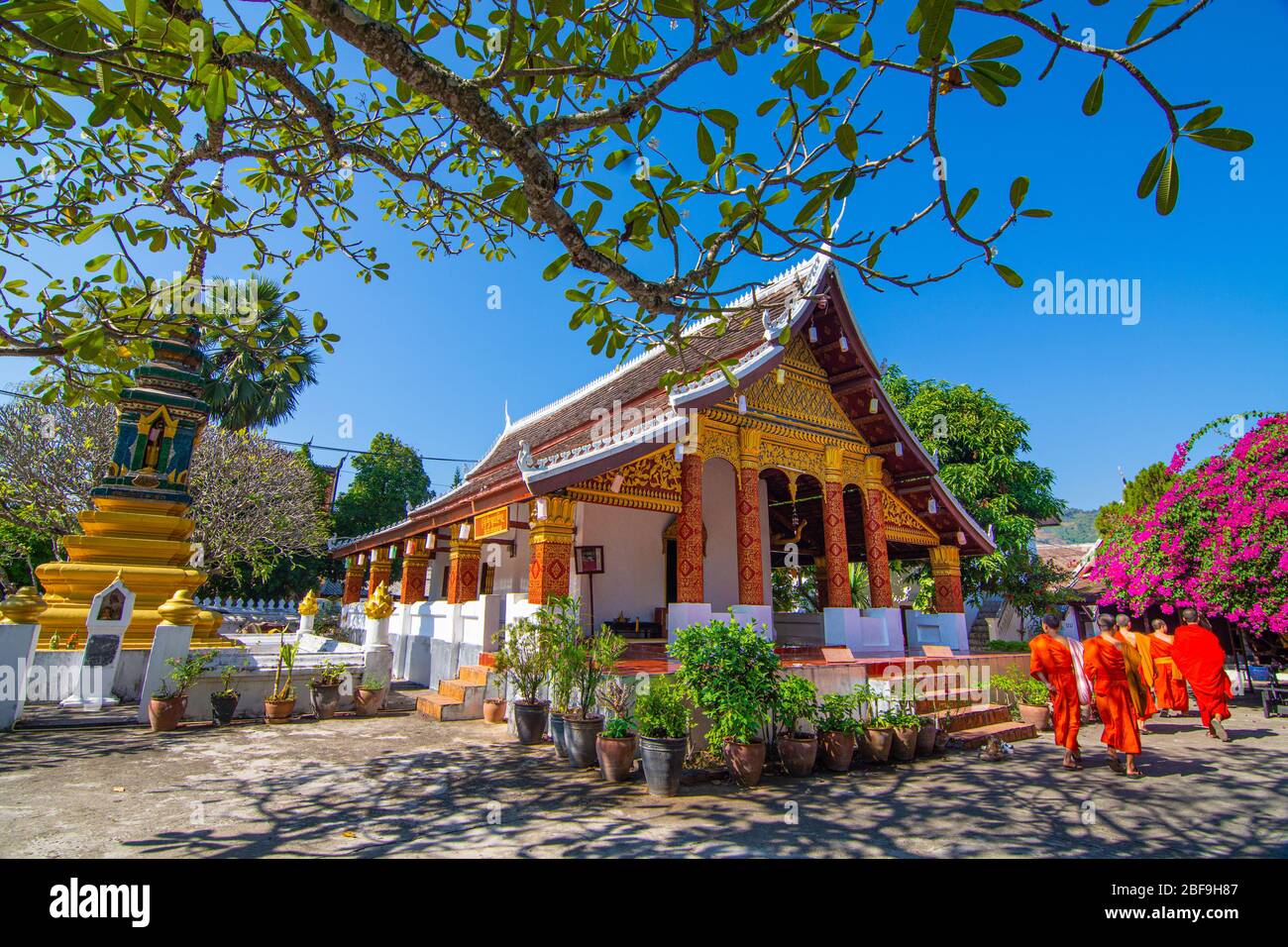 Wat Saen suk ka ram,buddish religion temple at Luang prabang Laos  in day time with monks. Stock Photo
