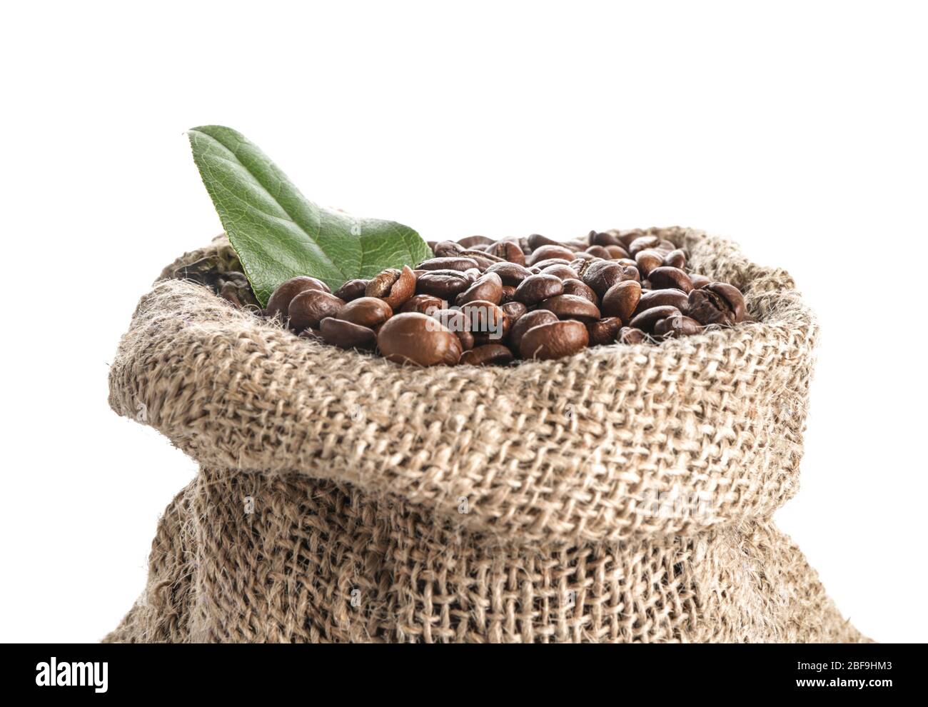 Bag with coffee beans on white background Stock Photo - Alamy
