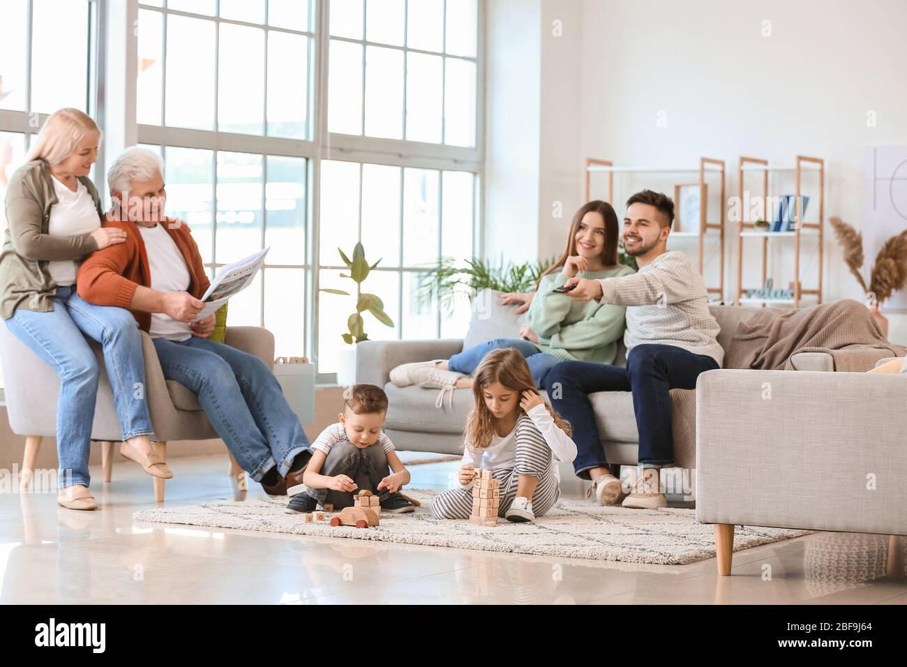Big family spending time together at home Stock Photo
