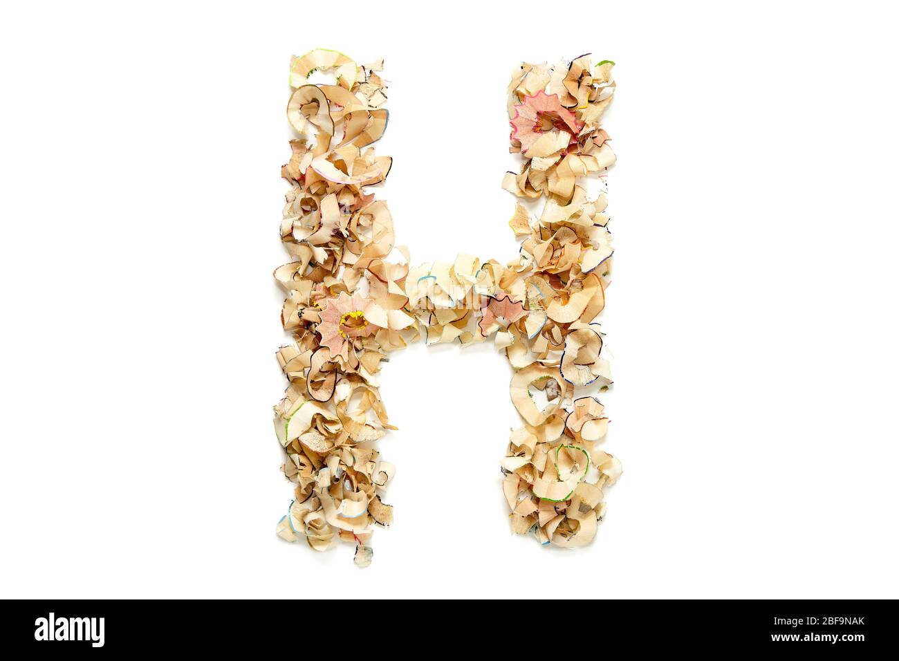 Letter H made from coloured pencil shavings for use in your design. Stock Photo