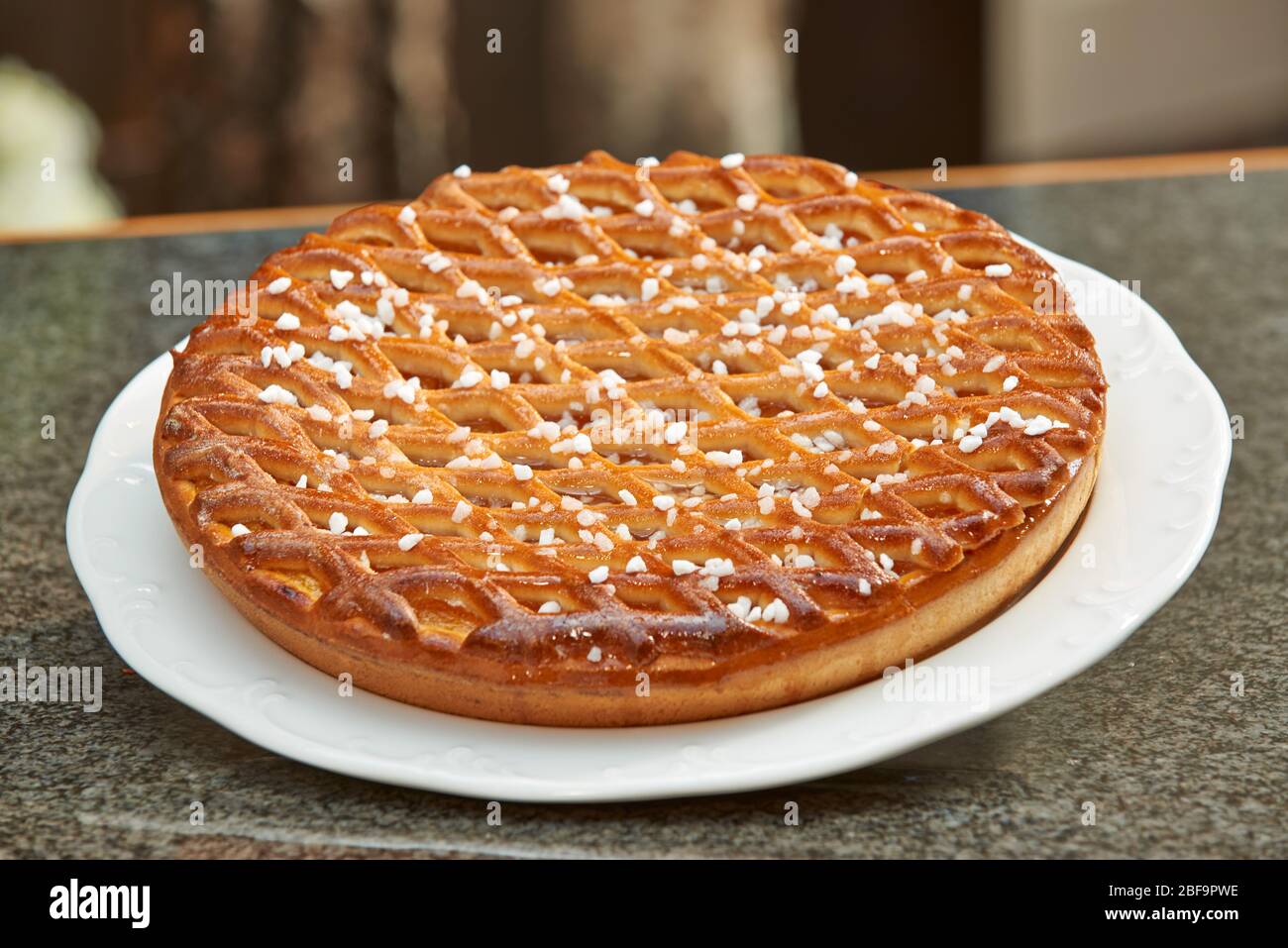 Vlaai, a traditional cake from the Limburg region of the Netherlands. This  type of cake is typically filled with either cherry or apricot Stock Photo  - Alamy
