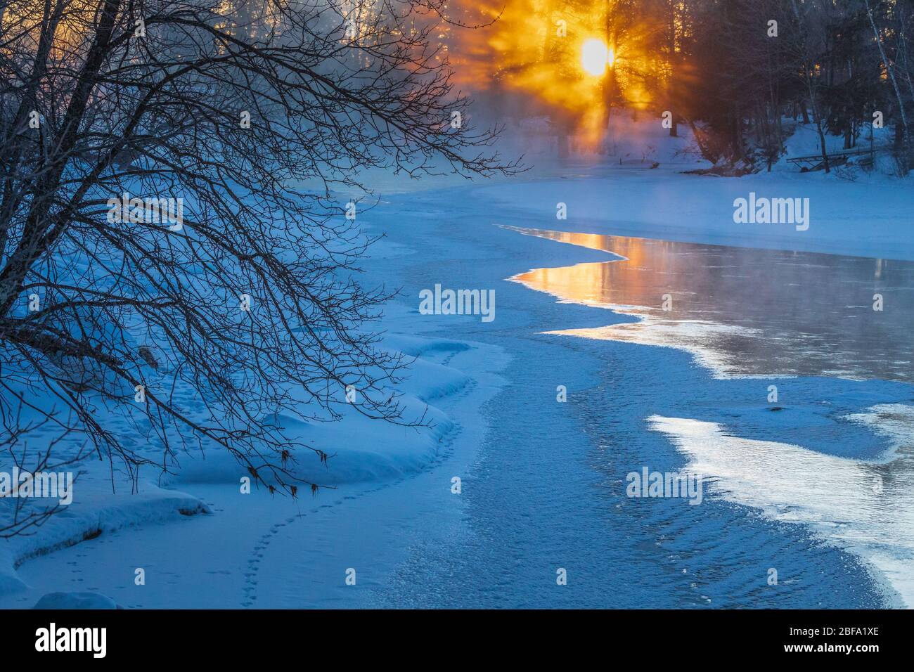 Sunrise on a frigid morning on the east fork of the Chippewa River. Stock Photo