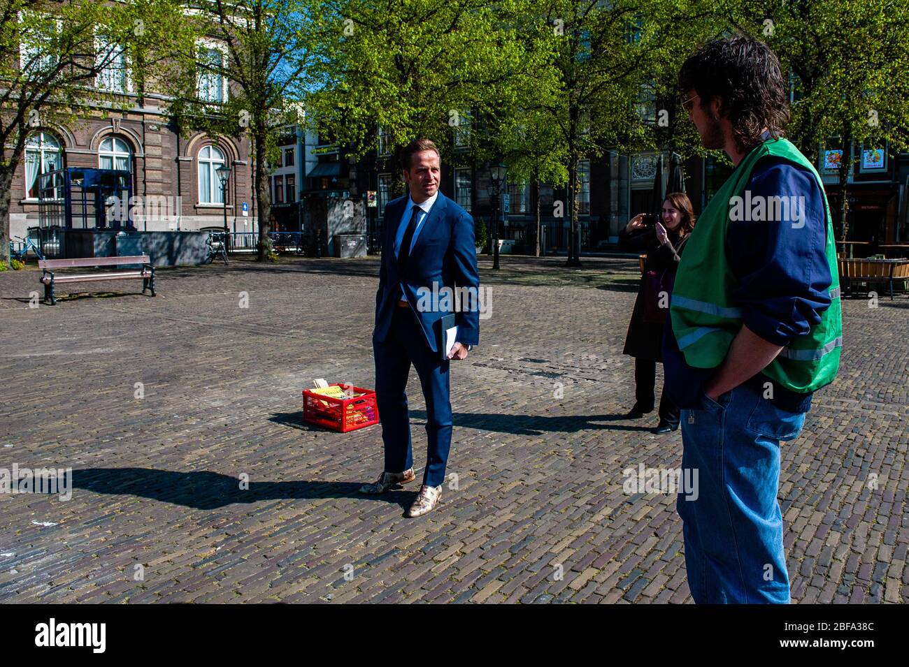 Hugo De Jonge Deputy Prime Minister And Minister Of Health Welfare And Sport In The Third Rutte Cabinet Speaks With An Xr Activist During The Coronavirus Covid 19 Lockdown The Square Where The