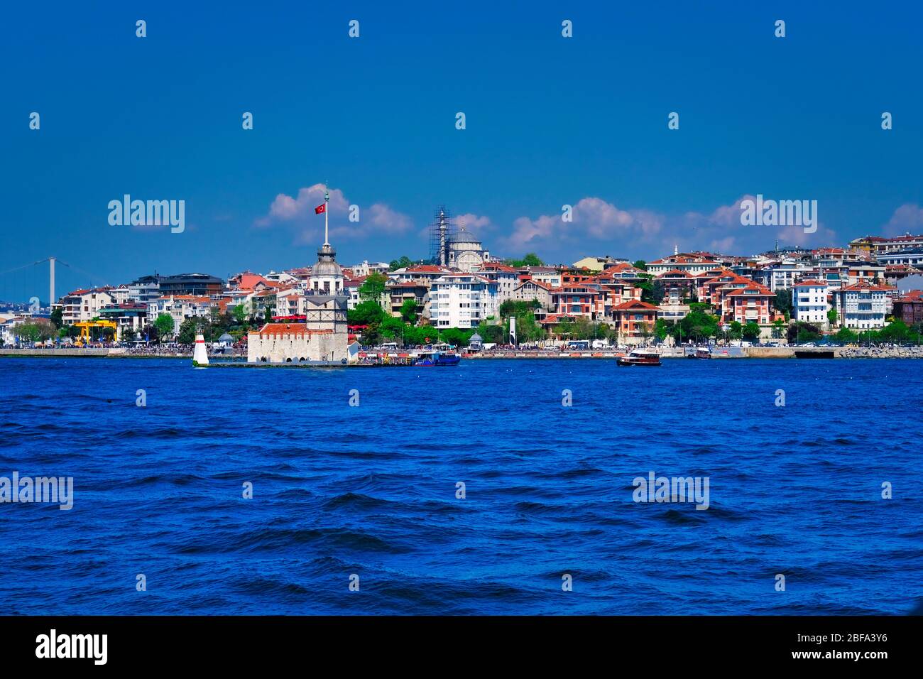 Landscape of the Maiden's Tower. The Maiden's Tower is on the waters of Uskudar and it can be considered as the cornerstone of the Bosphorus. Stock Photo