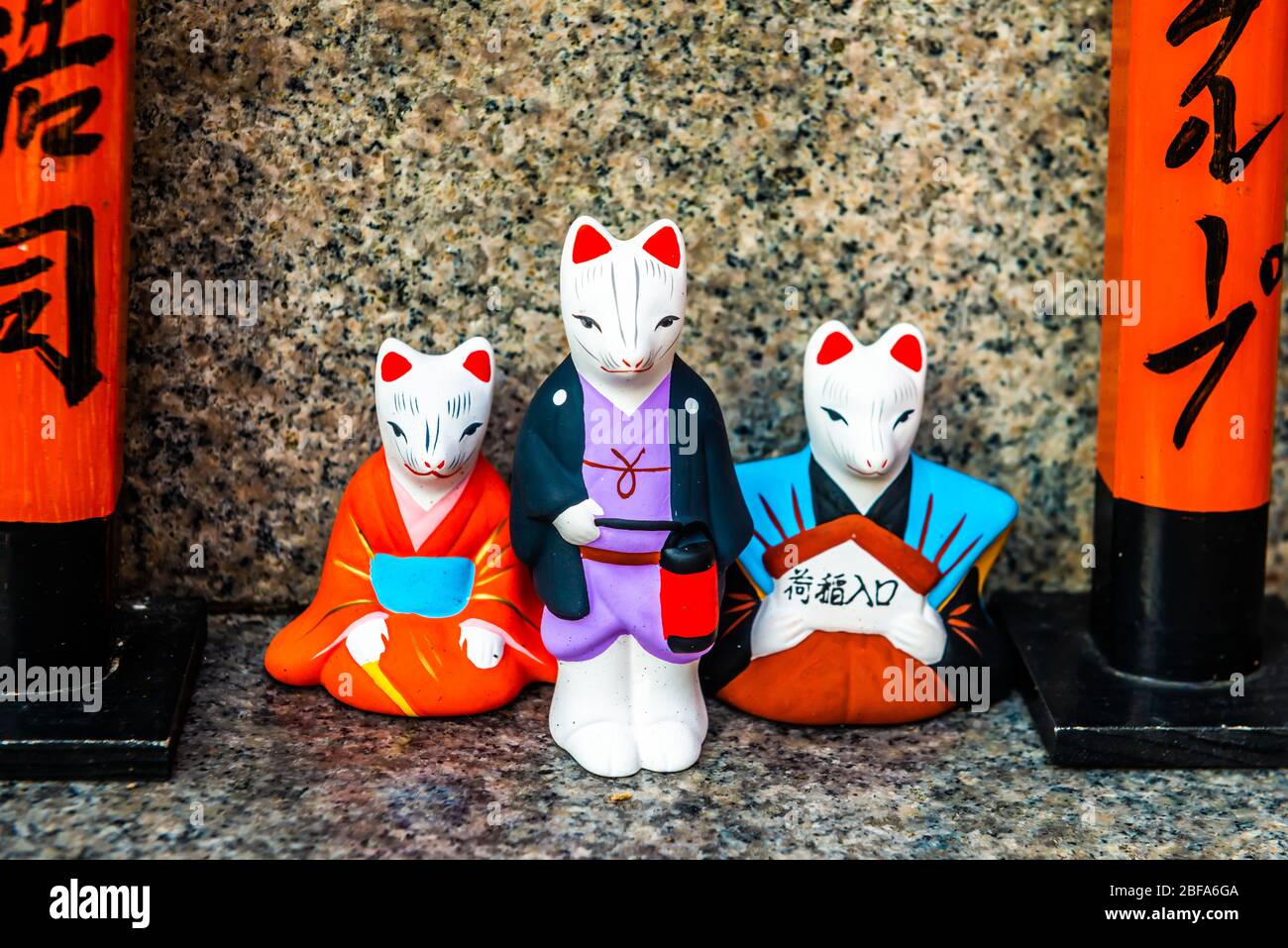Kyoto, Japan: October 30, 2019: The white foxes of Inari. Foxes (kitsune), considered to be the messengers of gods, are often found in Inari shrines. Stock Photo