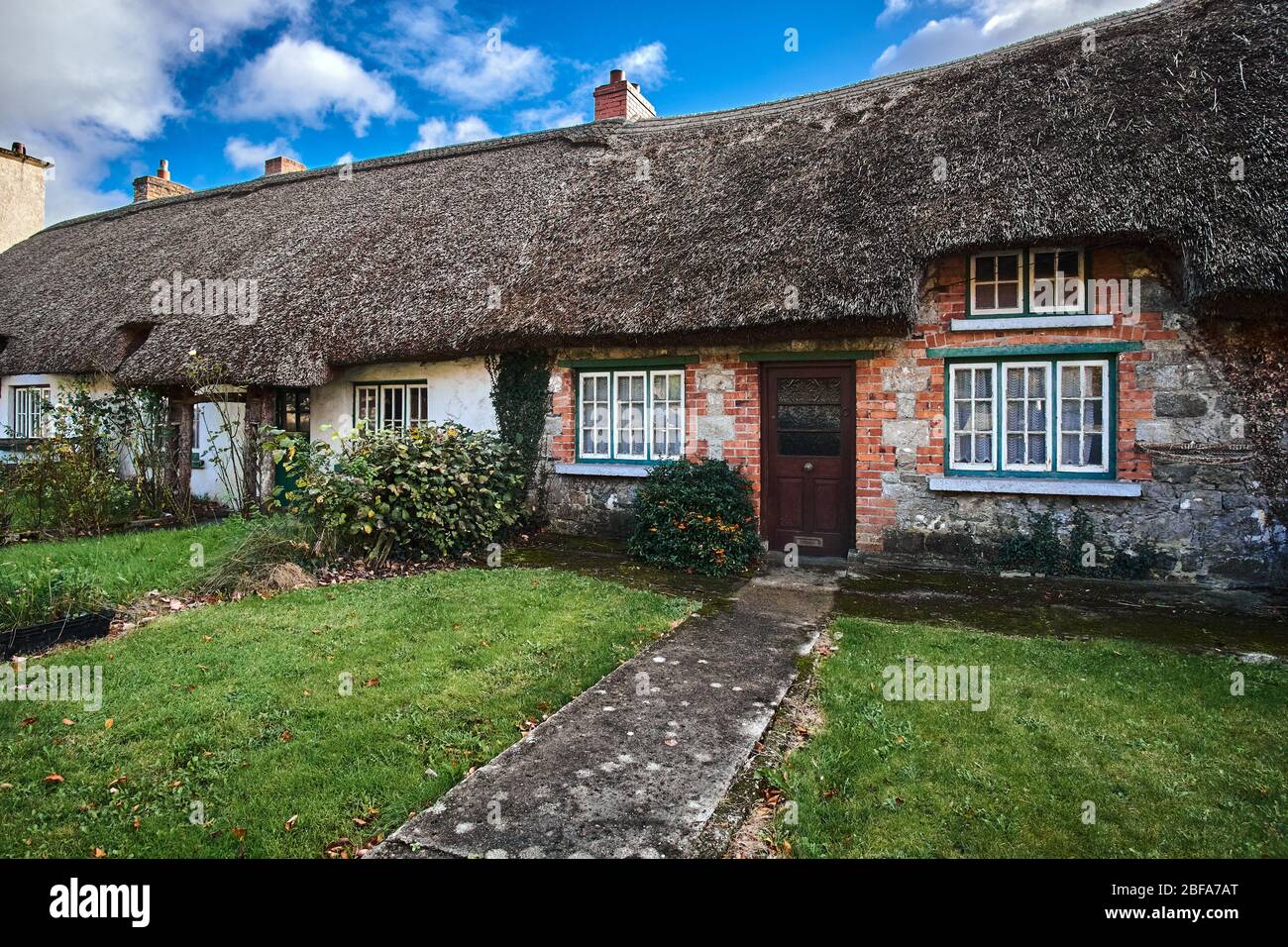 Traditional brick and stone house cottage in Adare County Limerick Ireland Stock Photo