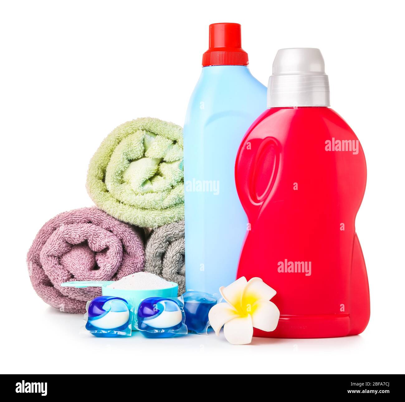 Towels and laundry detergents on white background Stock Photo Alamy