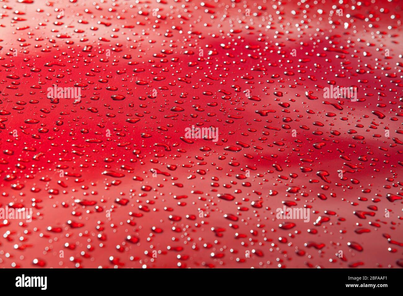 Raindrops on Cadillac Bonnet Stock Photo