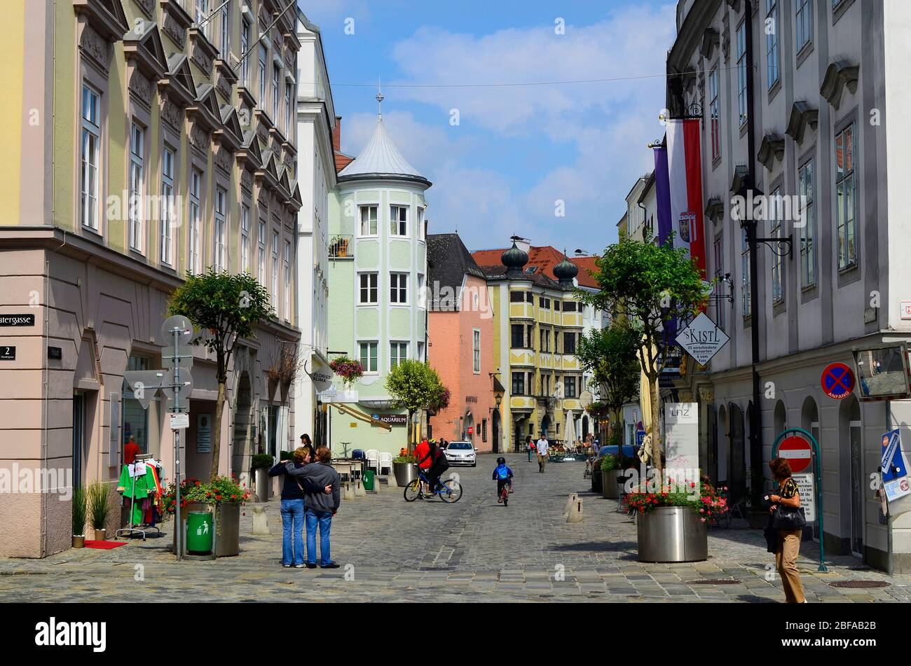 Linz, Austria - August 10th 2013: Unidentified people in pedestrian zone of inner district named Altstadt of former cultural capital of Europe 2009 in Stock Photo