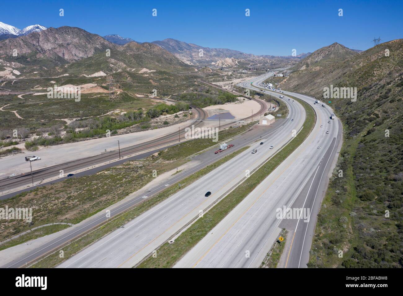 Aerial view of Interstate 15 (I-15) freeway as it climbs the grade at the Cajon Pass connecting Los Angeles with the desert and Las Vegas Stock Photo