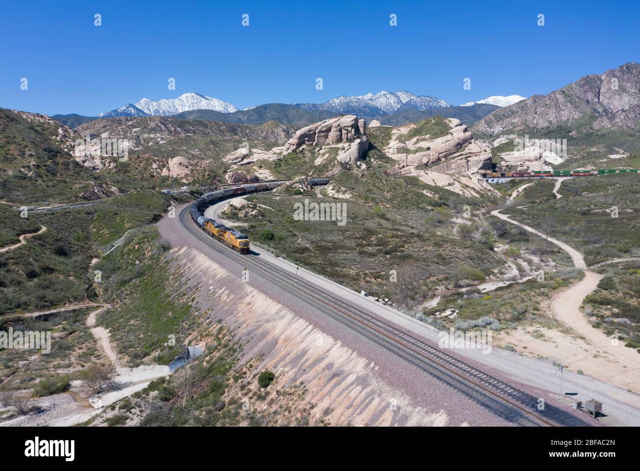 Freight train climbing the grade at Cajon Pass in San Bernardino County