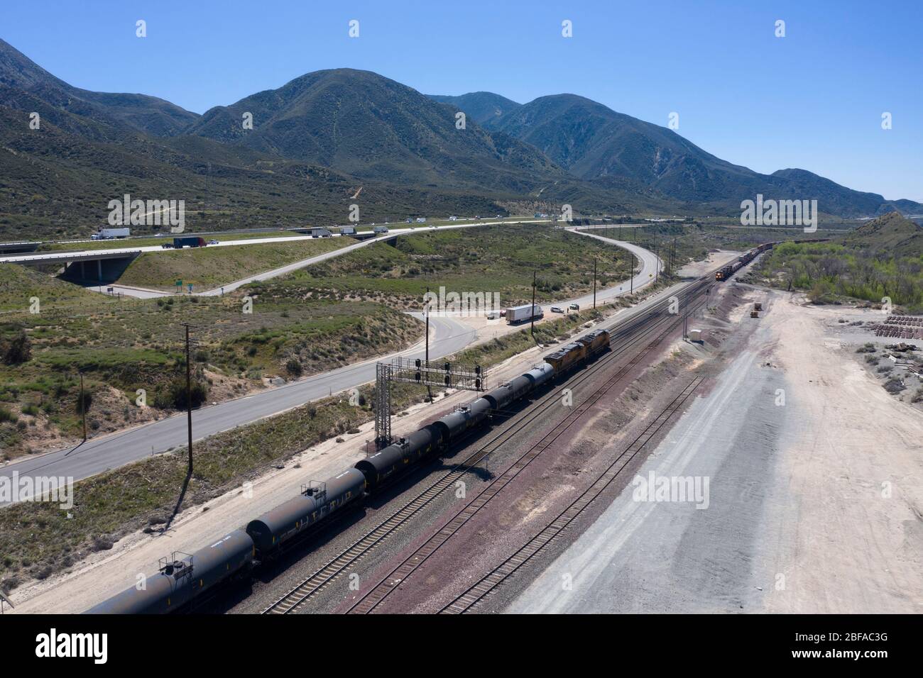 Freight train climbing the grade at Cajon Pass in San Bernardino County
