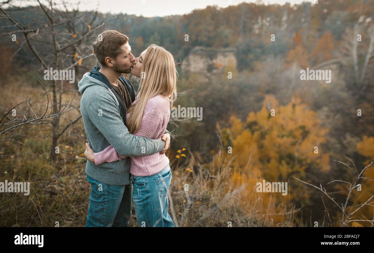 Hugs And Kisses Of Couple In Love Outdoors Stock Photo