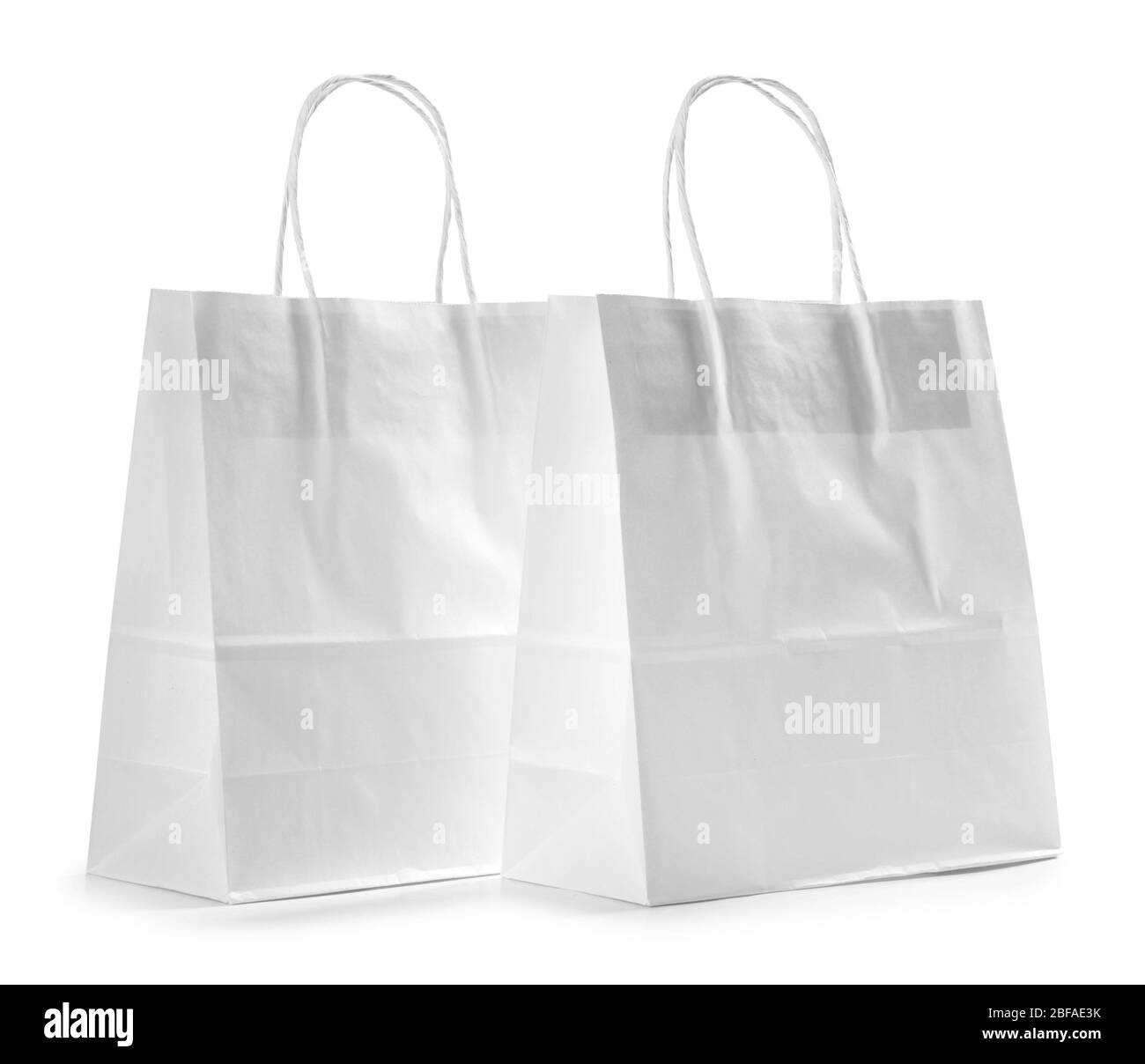 Paper shopping bags on white background Stock Photo Alamy