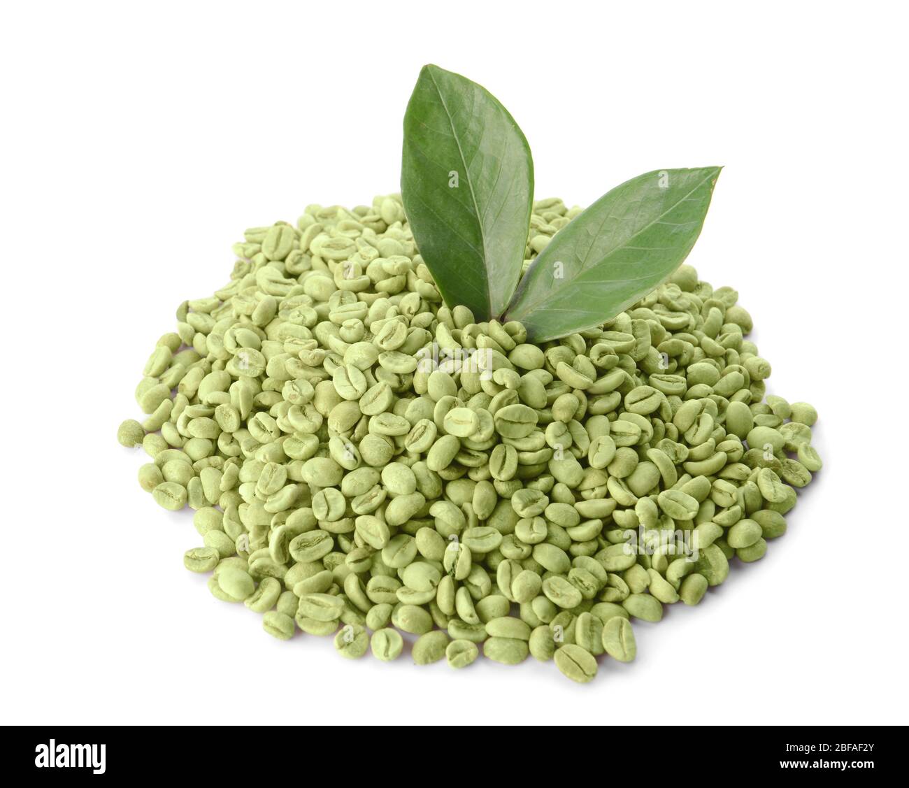 Green coffee beans on white background Stock Photo - Alamy