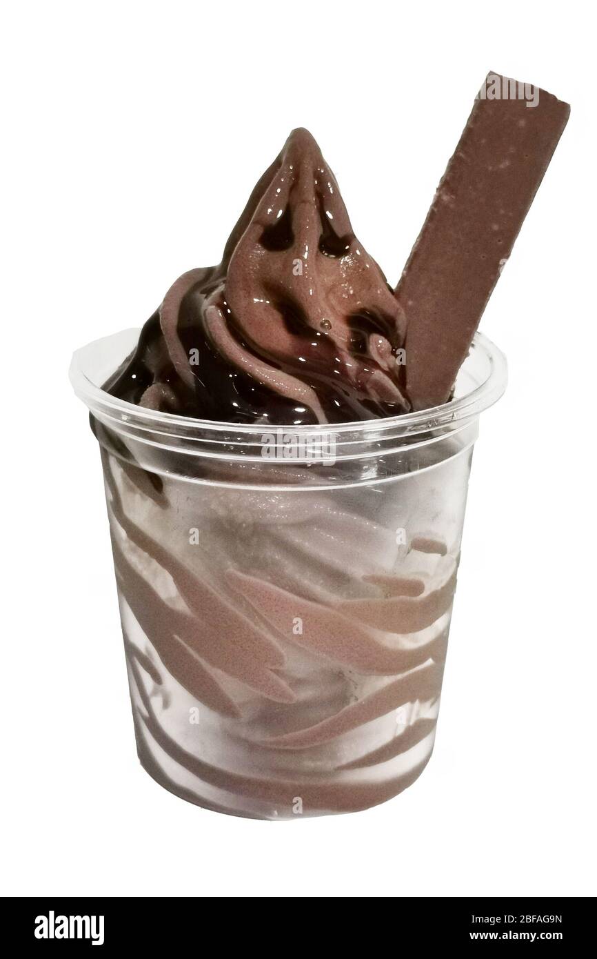 soft serve ice cream in a cup with topping Stock Photo Alamy