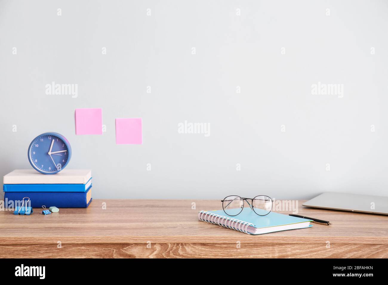 Modern stylish workplace near color wall Stock Photo
