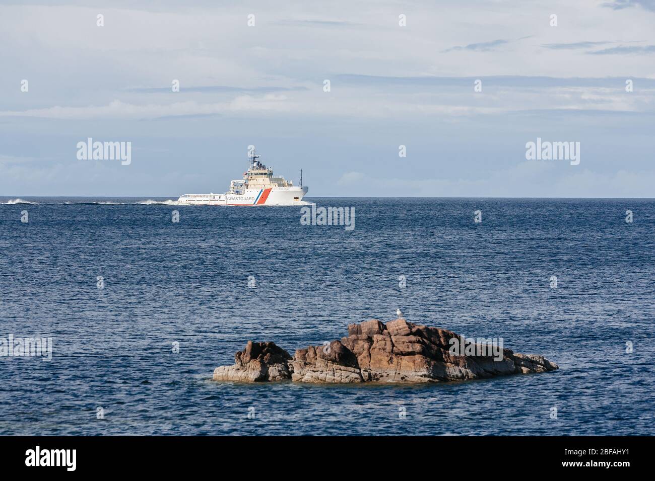 British Maritime and Coastguard Agency emergency towing vessel, Anglian Sovereign approaches Loch Ewe from the Inner Seas in the West of Scotland, UK Stock Photo
