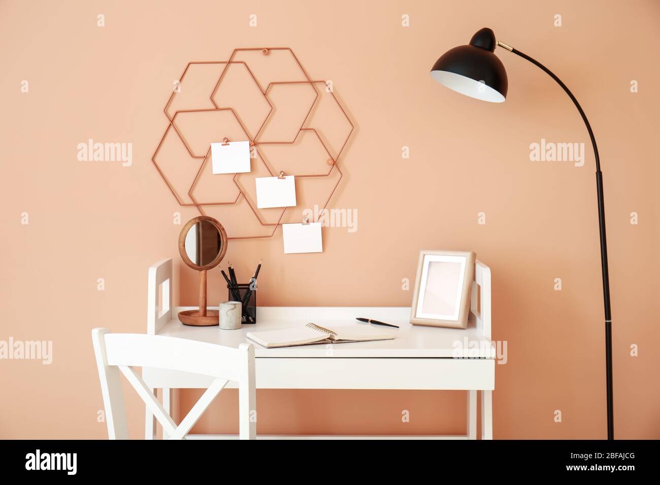 Modern stylish workplace near color wall Stock Photo