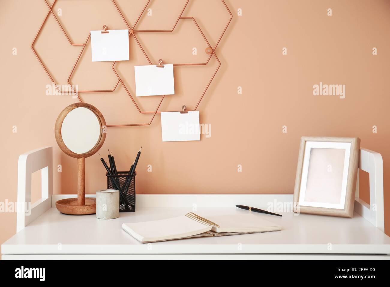 Modern stylish workplace near color wall Stock Photo
