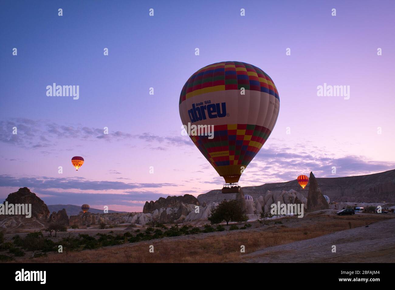 Air balloon flying on sky at Cappadocia, Goreme, Nevsehir, Turkey. Holiday, travel and vacation in Cappadocia Turkey Stock Photo