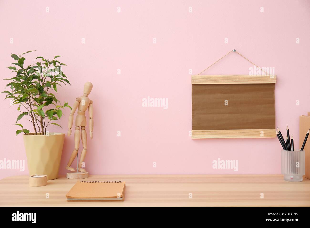 Modern stylish workplace near color wall Stock Photo