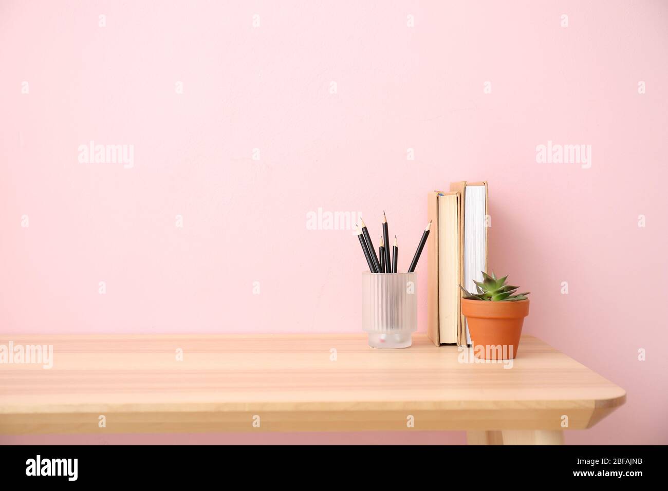 Modern stylish workplace near color wall Stock Photo