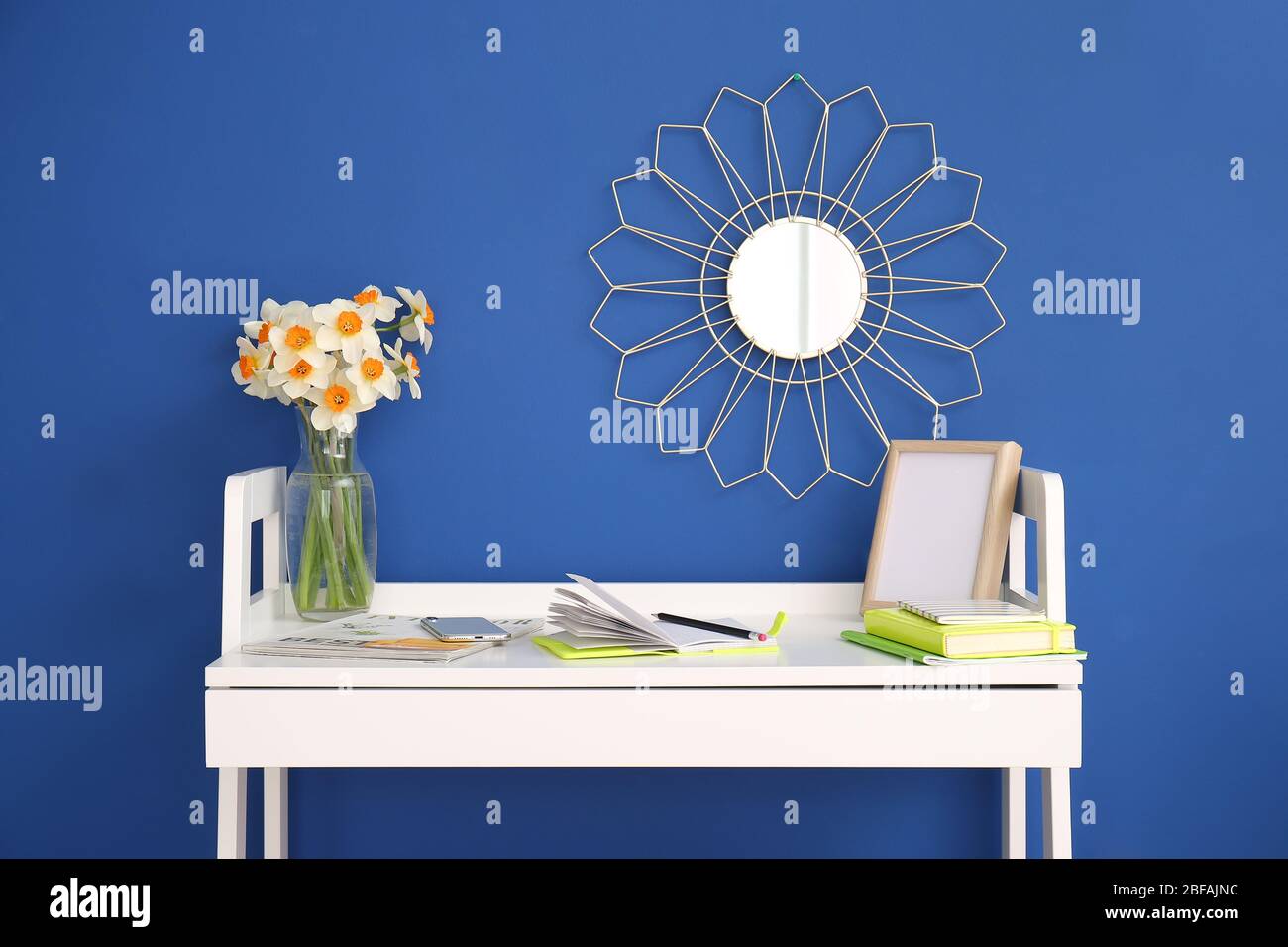 Modern stylish workplace near color wall Stock Photo