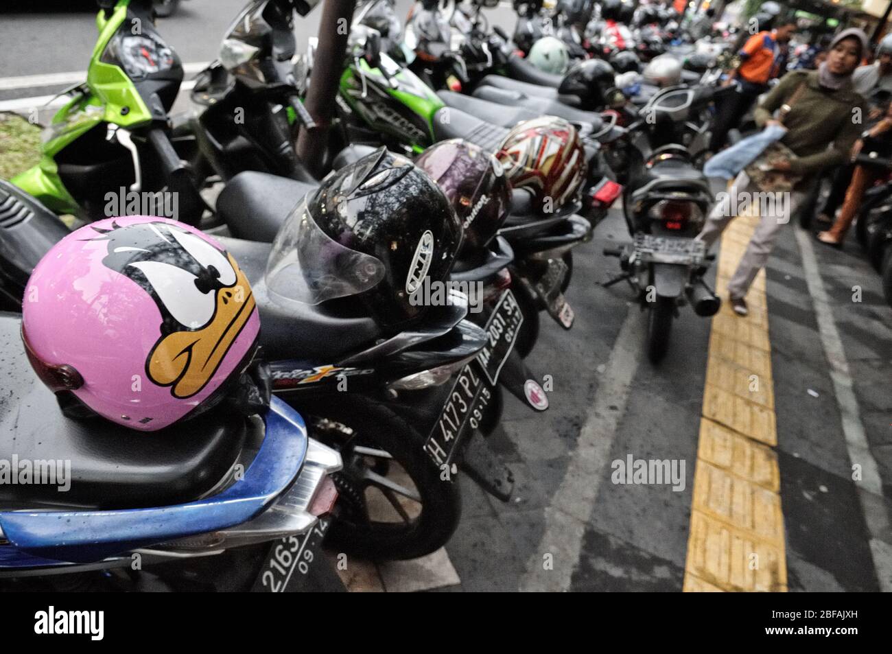Daffy Duck helmet and motorcycles in Yogyakarta, Java, Indonesia Stock Photo