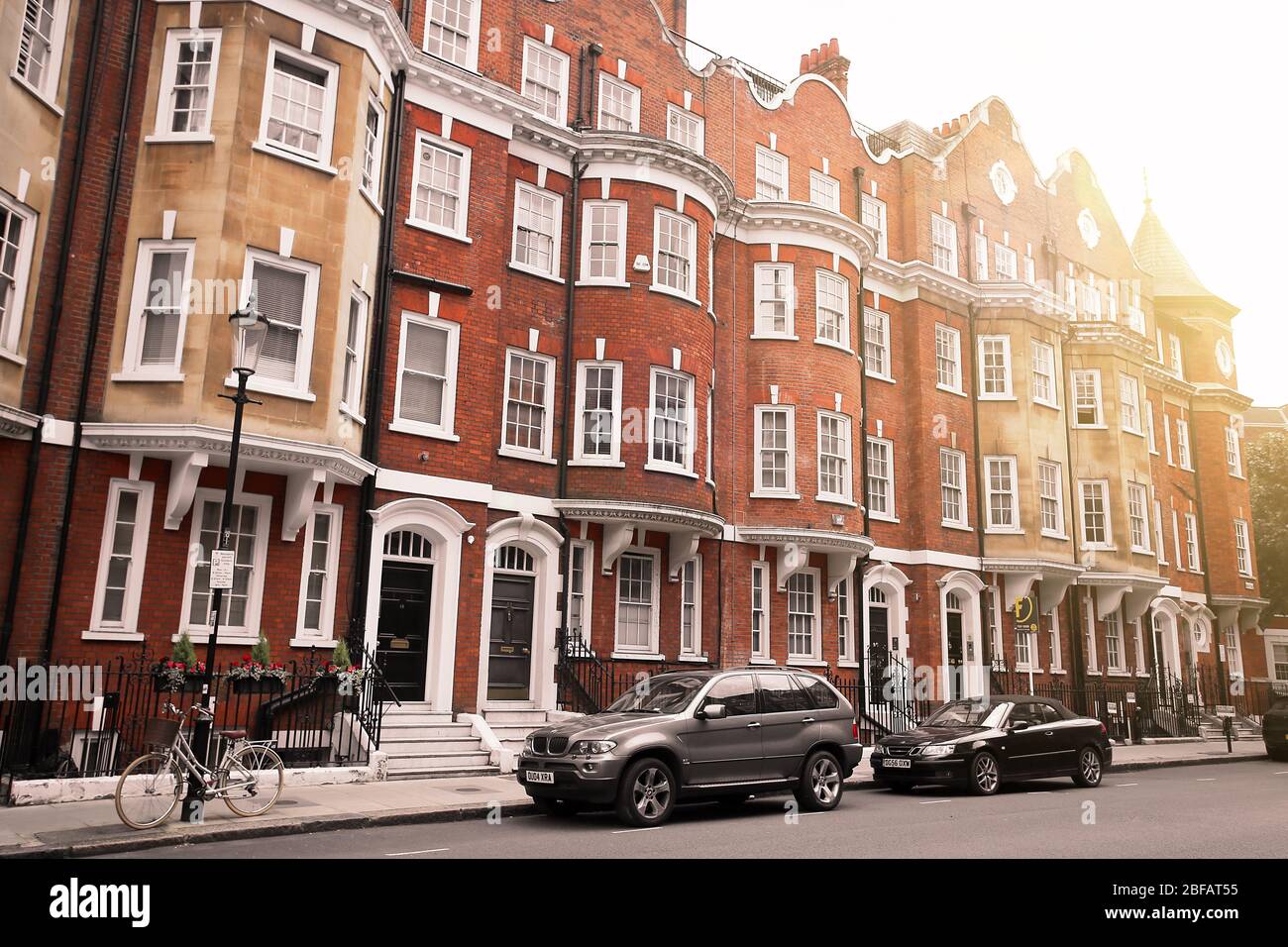 Brick row houses along Draycott Place and Cadogan Gardens near Cadogan