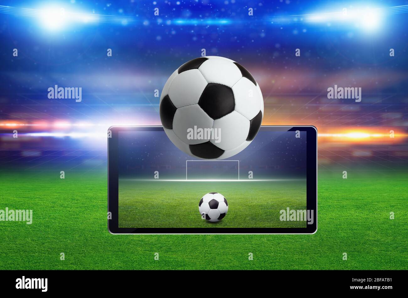 Abstract technological background - soccer game online concept, green soccer field illuminated bright spotlight, live streaming sports match Stock Photo