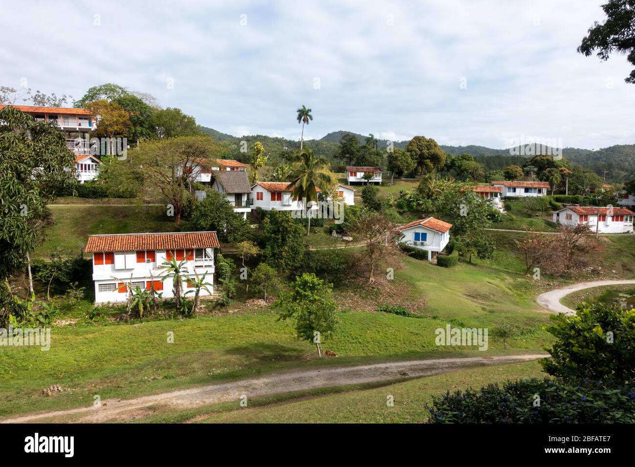Looking over the Las Terrazas Complex apartments and villas with mountains beyond, Cuba Stock Photo
