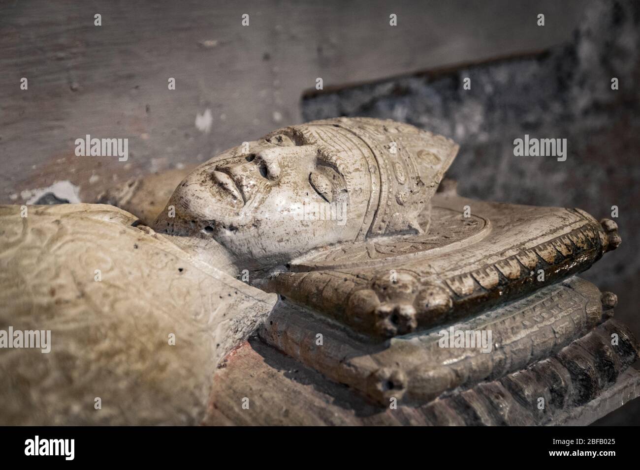 Sovana, Italy - June 25, 2017: The 15th century travertine sarcophagus that originally housed the remains of San Mamiliano. Tomb of San Mamiliano. Stock Photo