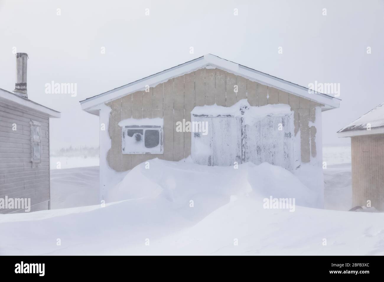 Sheds with snowdrifts in Buchans, Newfoundland, Canada Stock Photo Alamy