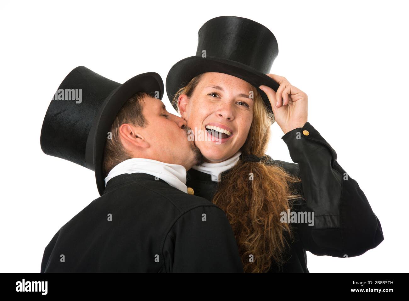 Chimney sweep gives chimney sweep woman a kiss Stock Photo Alamy