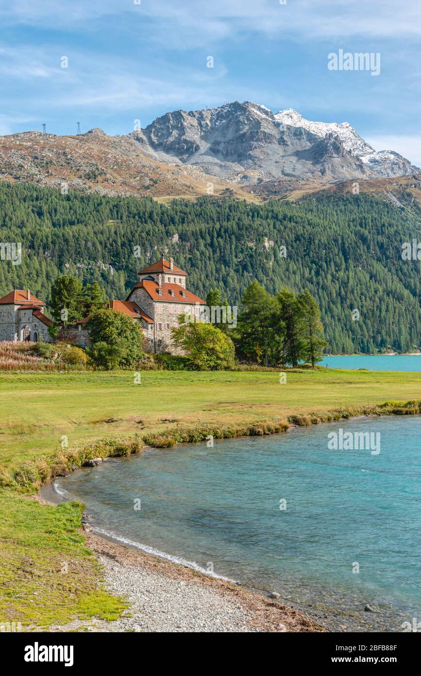 Crap da Sass castle in spring landscape at Lake Silvaplana, Switzerland Stock Photo