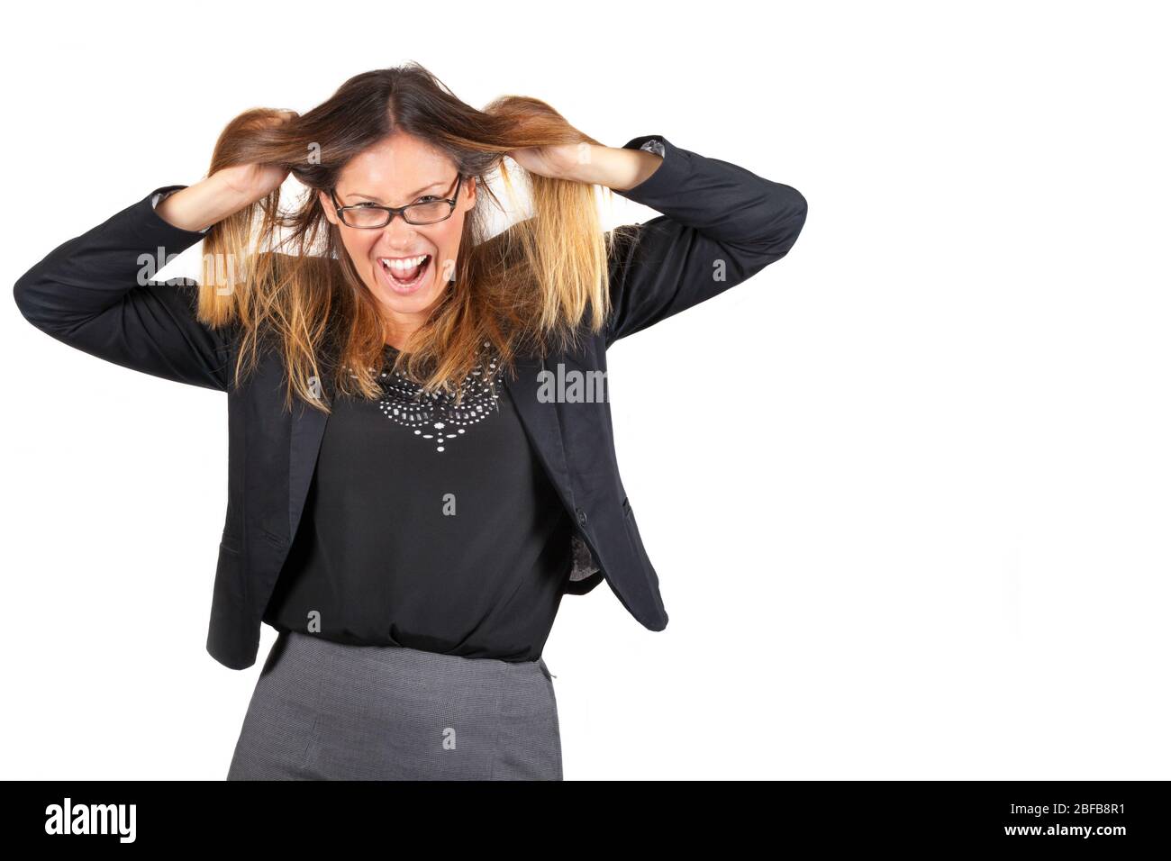 Stressed business woman pulling hair isolated on white background. Work crisis.On white. Stock Photo