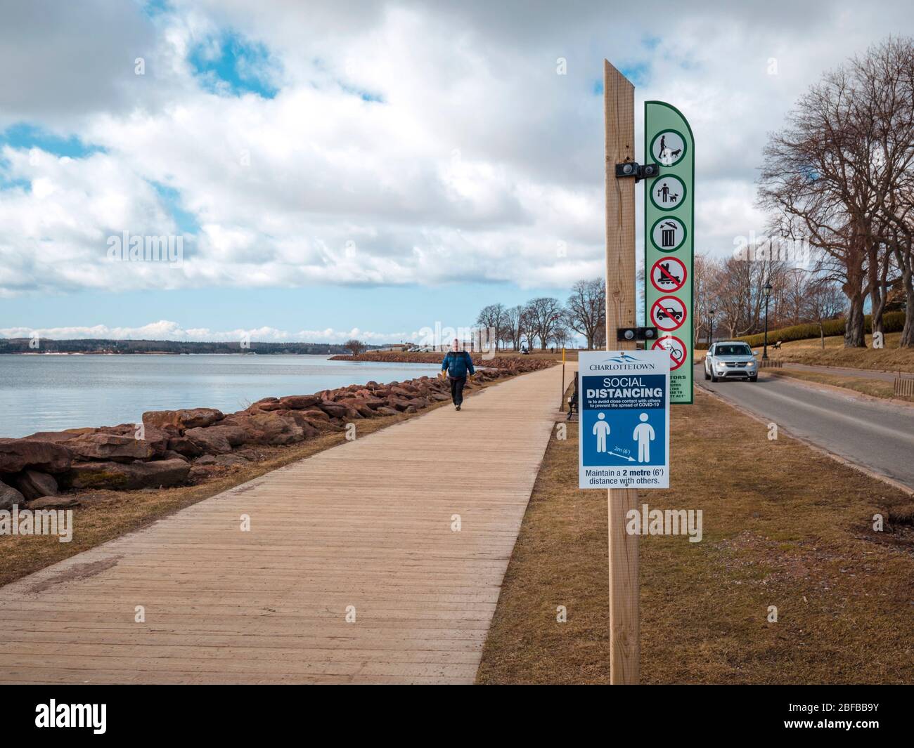 A social distance instruction sign at Victoria Park in Charlottetown, PEI, Canada Stock Photo