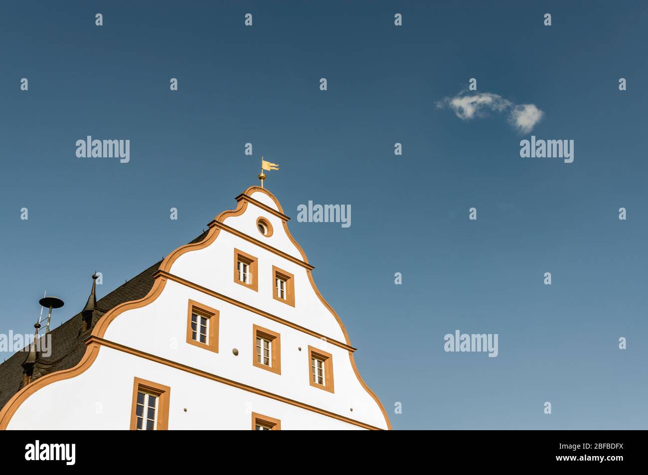 armory Schweinfurt gable wall with tail gable and text blue sky a cloud Stock Photo