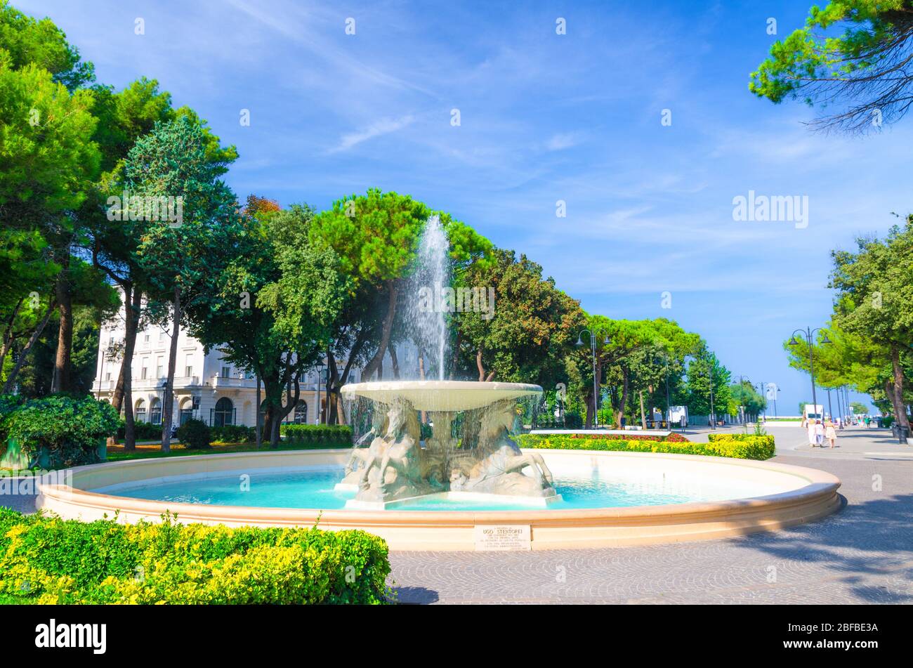 Quattro cavalli Four horses fountain with turquoise water in Parco Federico  Fellini park with green trees in touristic city centre Rimini with blue sk  Stock Photo - Alamy