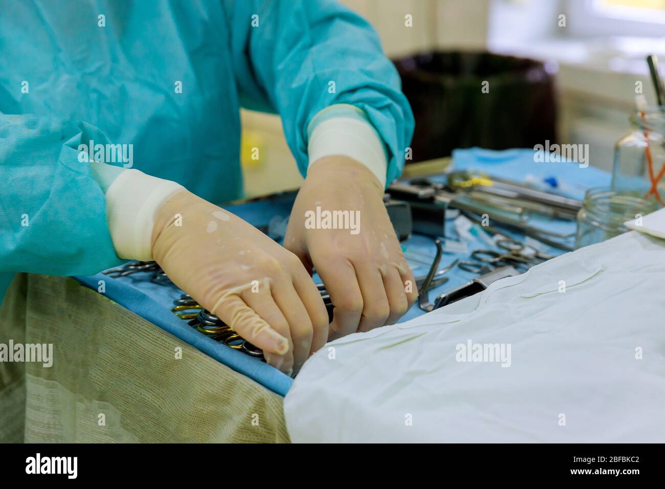 Surgery and emergency operation room with his team with medical tools