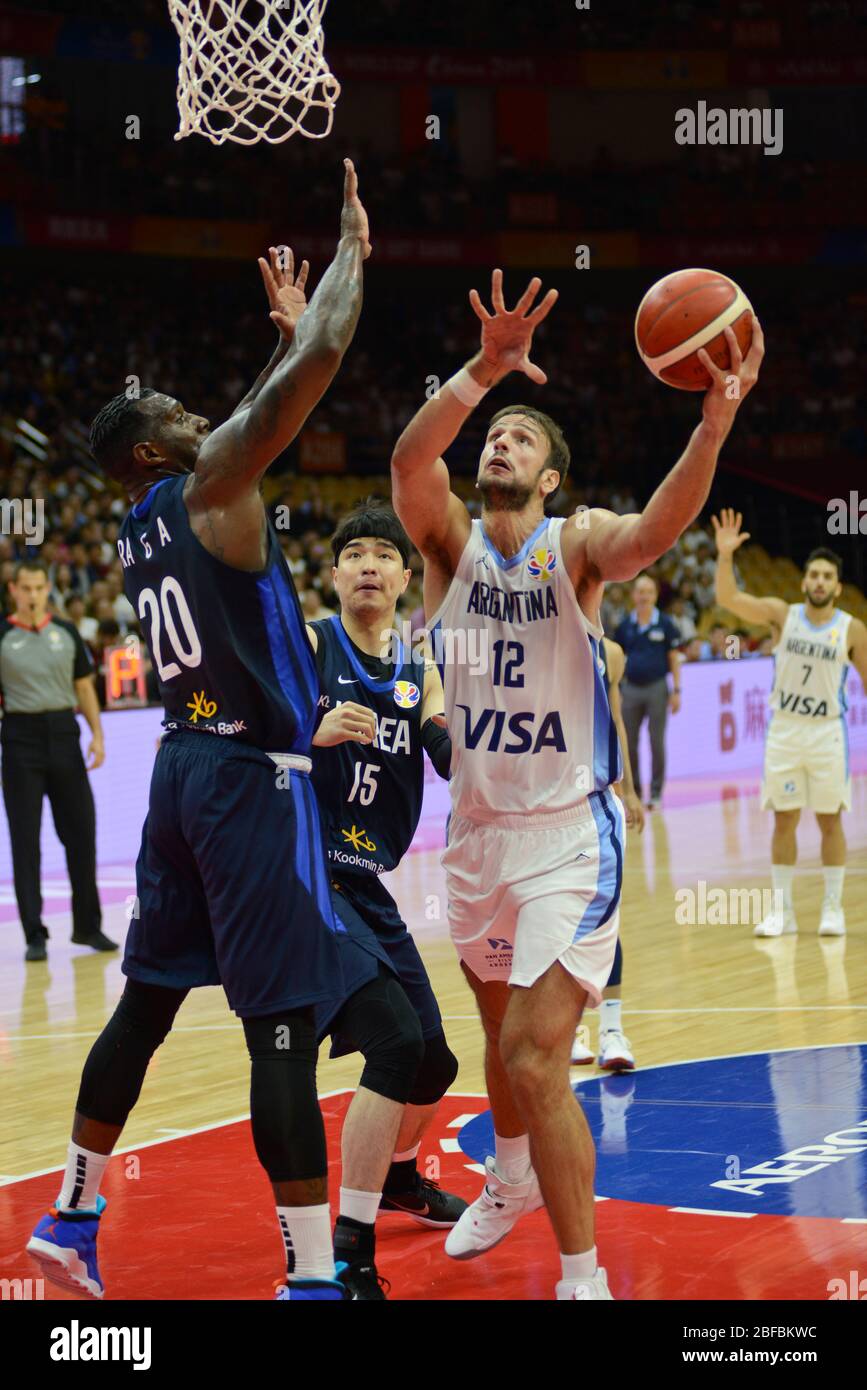 Marcos Delía (Argentina) scoring in the paint. Argentina - South Korea. FIBA Basketball World Cup China 2019. First Round Stock Photo