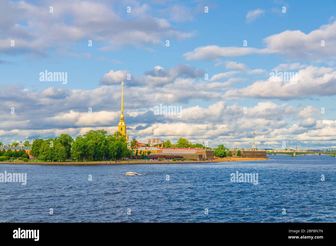 The Peter and Paul Fortress citadel, Saints Peter and Paul Cathedral Orthodox church with gold spire, fortress walls on Zayachy Hare Island, Neva rive Stock Photo