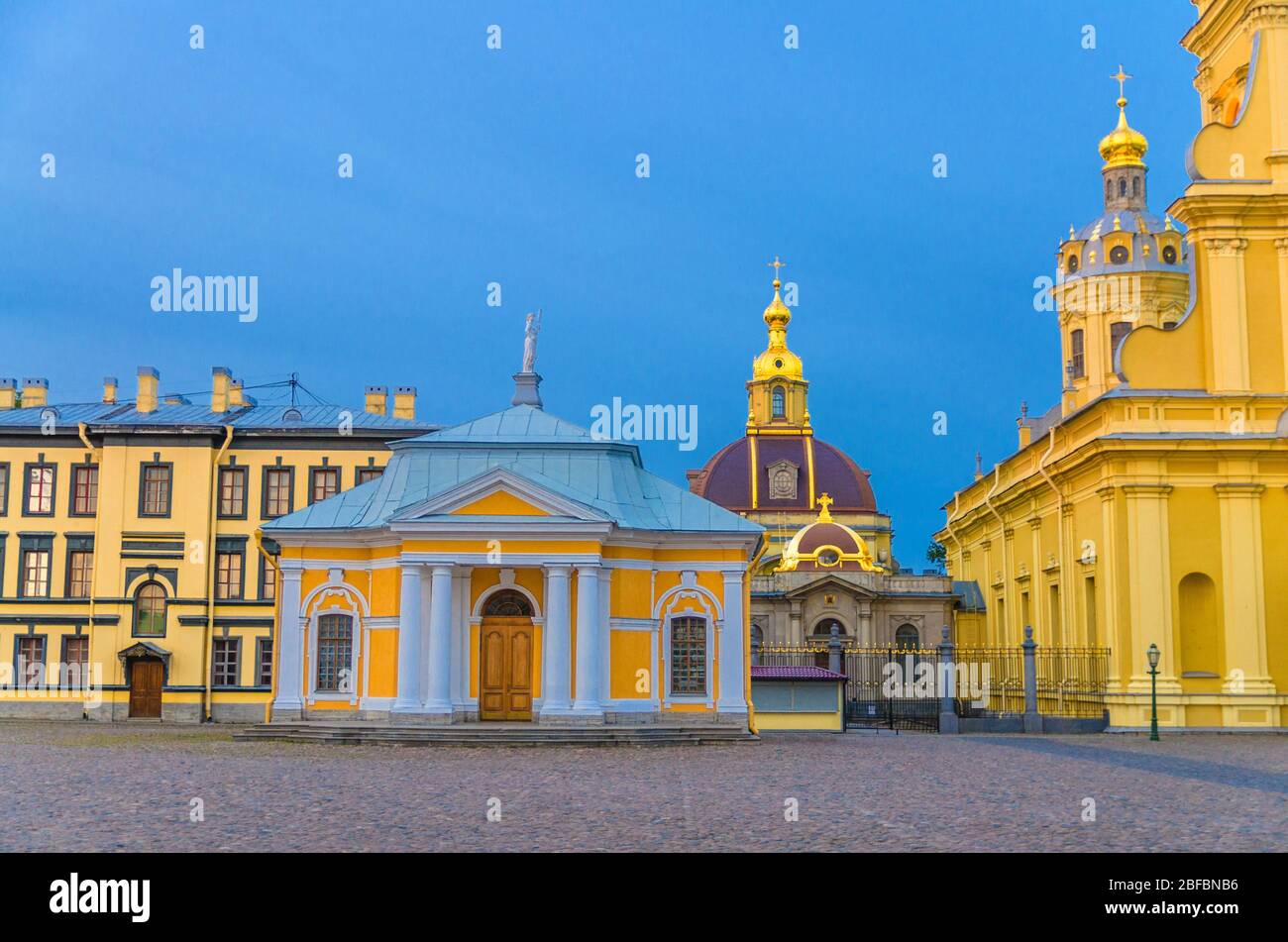 Boot house near Saints Peter and Paul Cathedral Orthodox church in Peter and Paul Fortress citadel on Zayachy Hare Island, evening dusk twilight view, Stock Photo