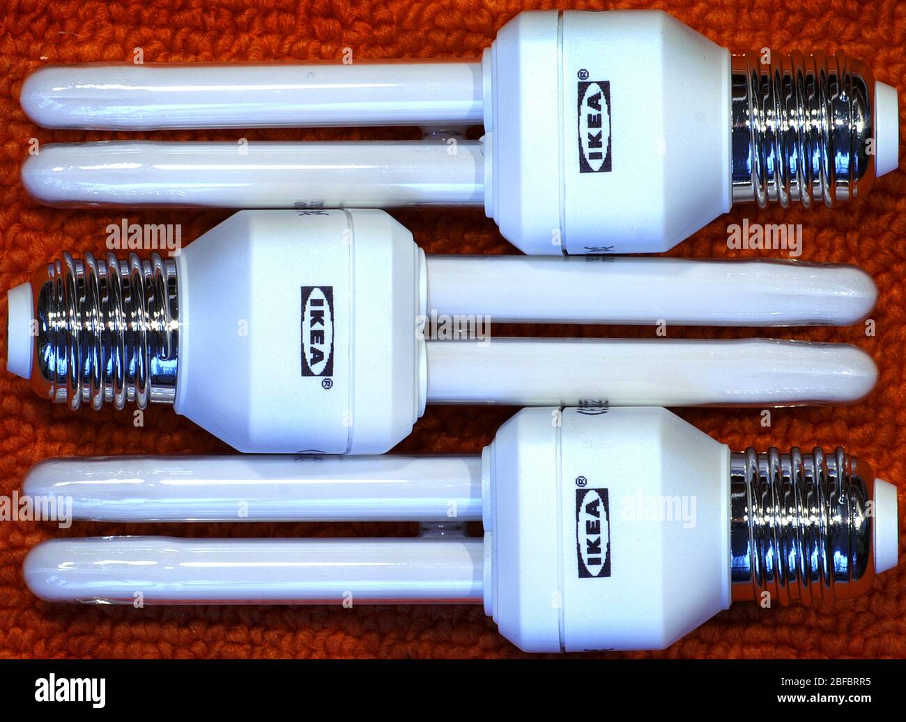 three-ikea-energy-saver-lightbulbs-stock-photo-alamy
