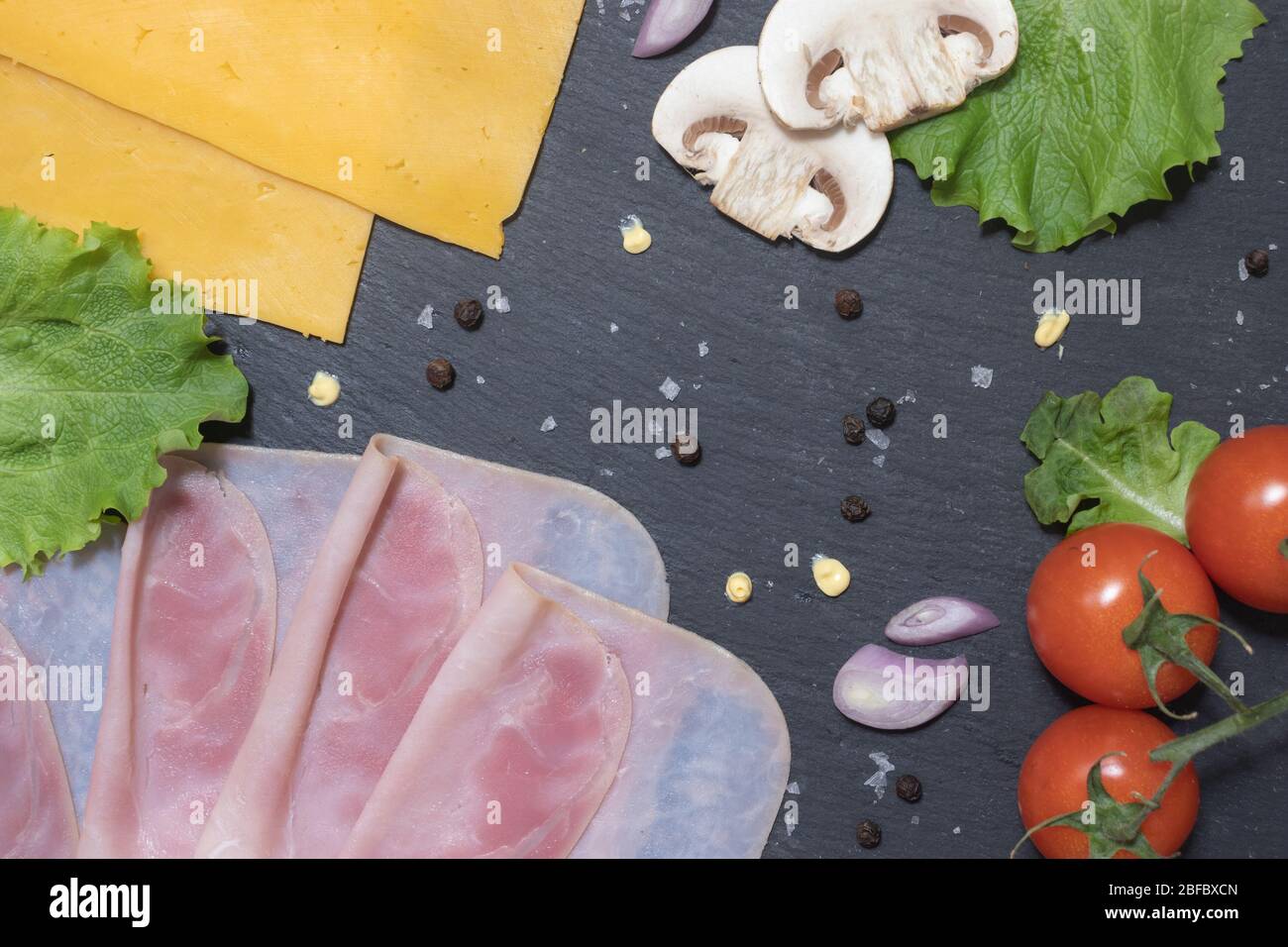 Fresh tasty hamburger ingredients with cheese and mushrooms Stock Photo