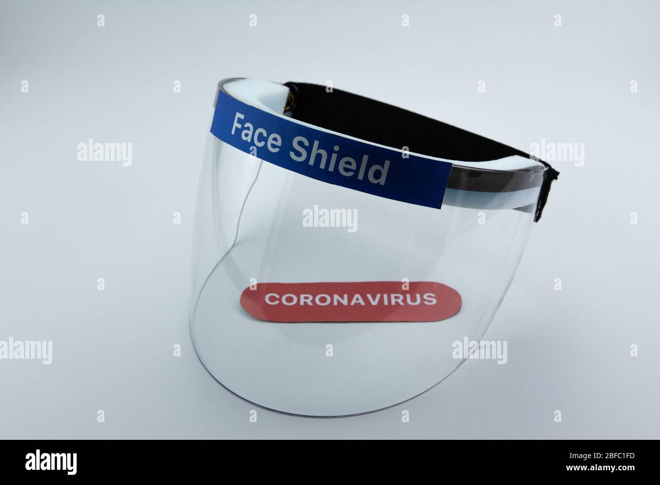 Face shield on a white background. Pandemic COVID-19 virus and protection against coronavirus concept. Stock Photo
