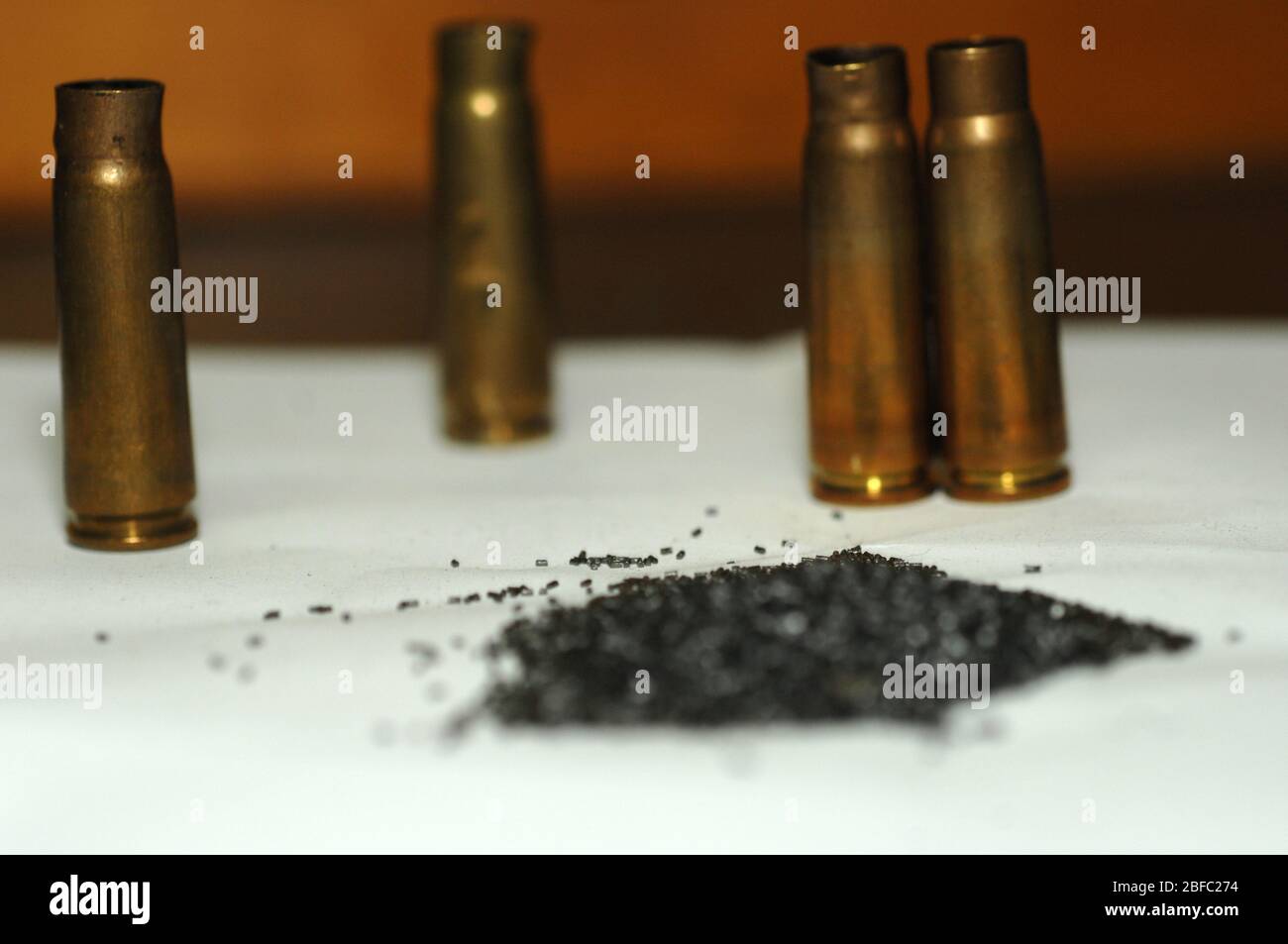 Gunpowder surrounded by bullet cartridge casings Stock Photo Alamy