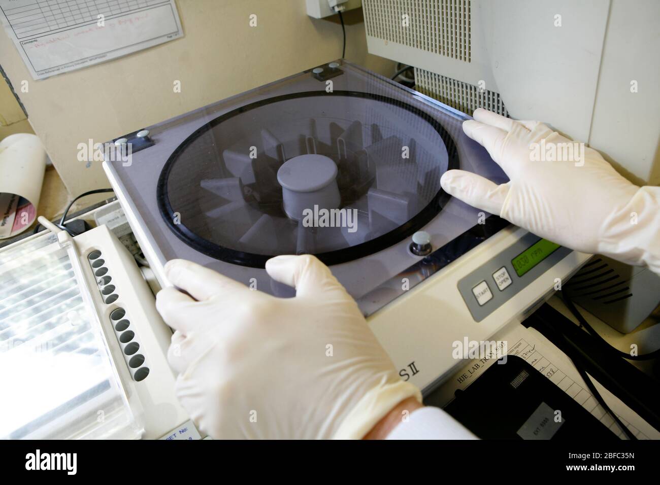 Centrifuge used to separate blood samples hires stock photography and