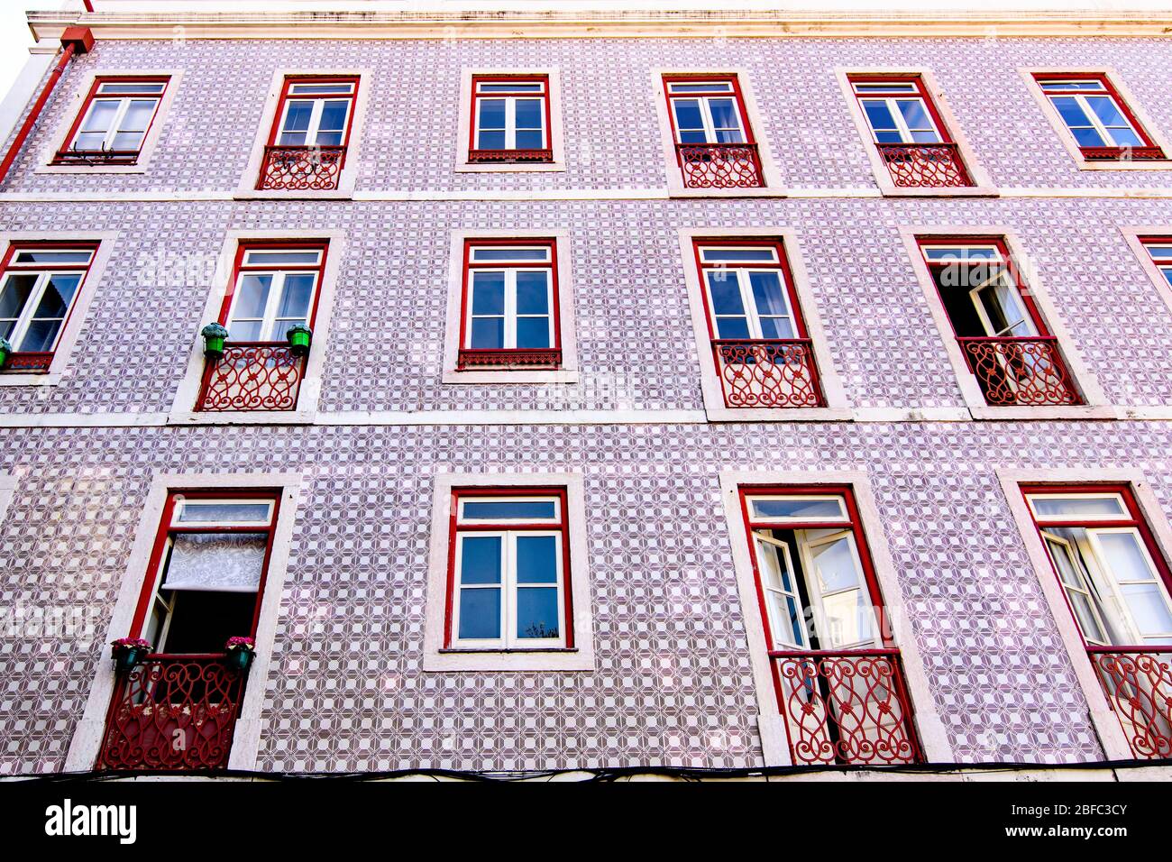 Residential building with a luxury Louis Vuitton store in the groundfloor  built in neoclassical architecture in downtown Lisbon, Portugal Stock Photo  - Alamy